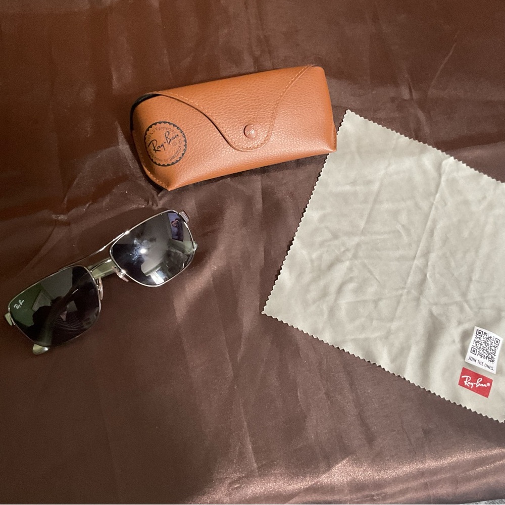 Ray-Ban RB3483 sunglasses with a gunmetal frame and green polarized
